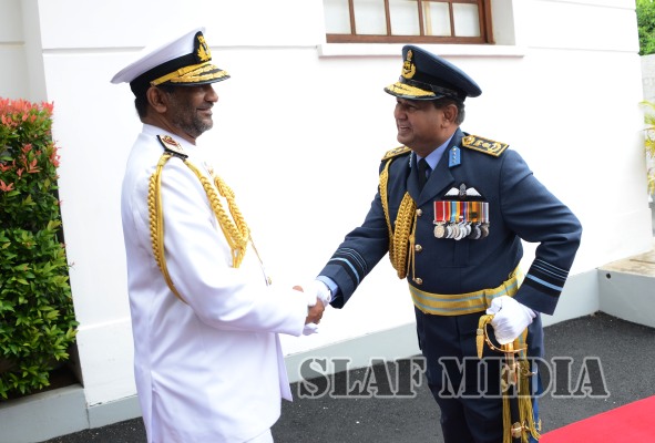 Air Force Commander Calls on Navy Commander