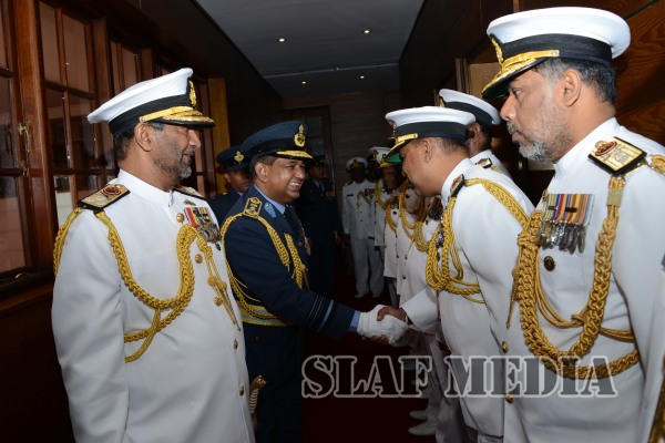 Air Force Commander Calls on Navy Commander