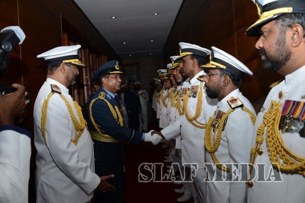 Air Force Commander Calls on Navy Commander