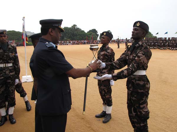 A Colorful Passing Parade Overlooking the Thambalagamuwa Lagoon