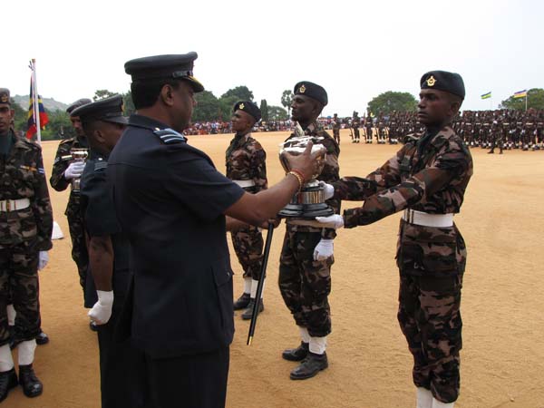 A Colorful Passing Parade Overlooking the Thambalagamuwa Lagoon