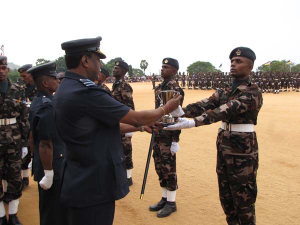 A Colorful Passing Parade Overlooking the Thambalagamuwa Lagoon
