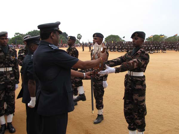 A Colorful Passing Parade Overlooking the Thambalagamuwa Lagoon