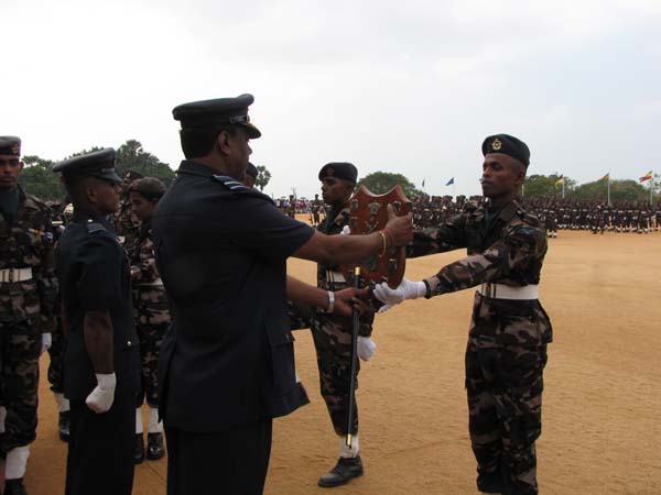 A Colorful Passing Parade Overlooking the Thambalagamuwa Lagoon