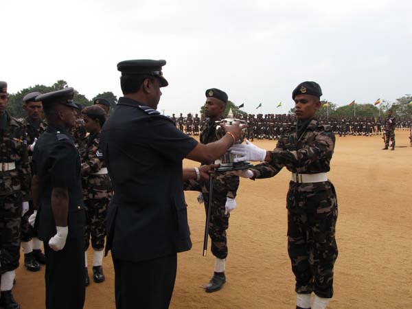 A Colorful Passing Parade Overlooking the Thambalagamuwa Lagoon