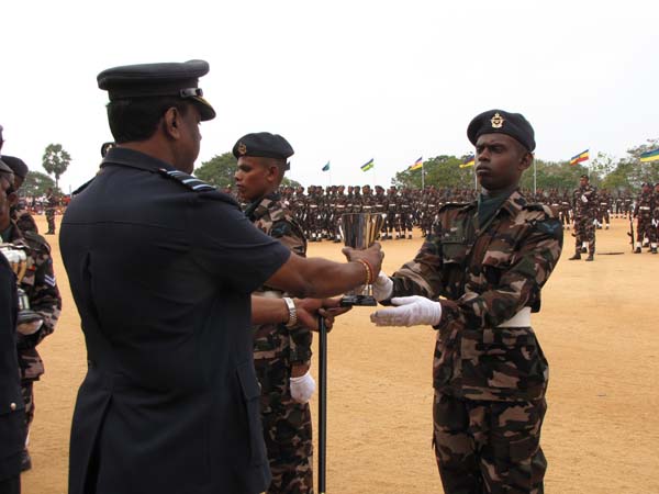 A Colorful Passing Parade Overlooking the Thambalagamuwa Lagoon