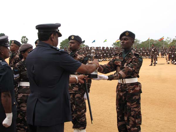 A Colorful Passing Parade Overlooking the Thambalagamuwa Lagoon