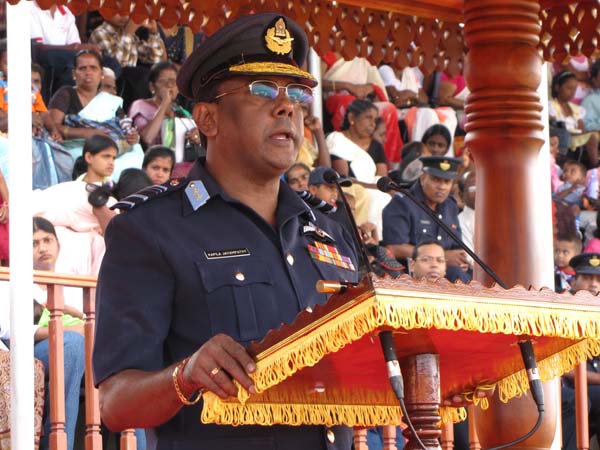 A Colorful Passing Parade Overlooking the Thambalagamuwa Lagoon