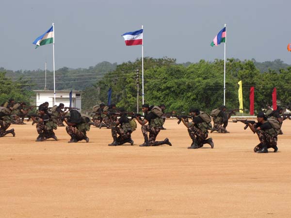 A Colorful Passing Parade Overlooking the Thambalagamuwa Lagoon