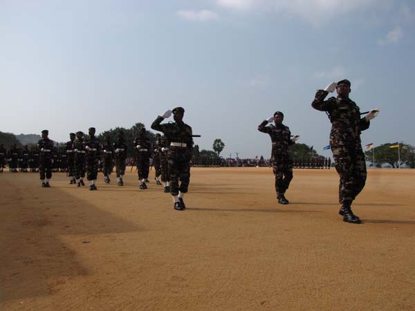 A Colorful Passing Parade Overlooking the Thambalagamuwa Lagoon
