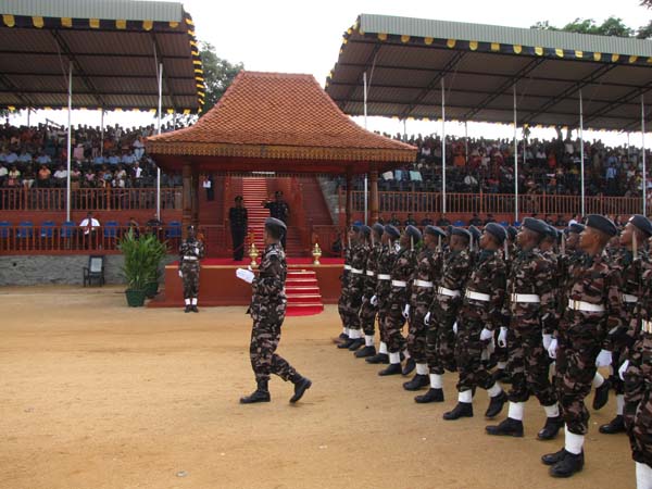 A Colorful Passing Parade Overlooking the Thambalagamuwa Lagoon