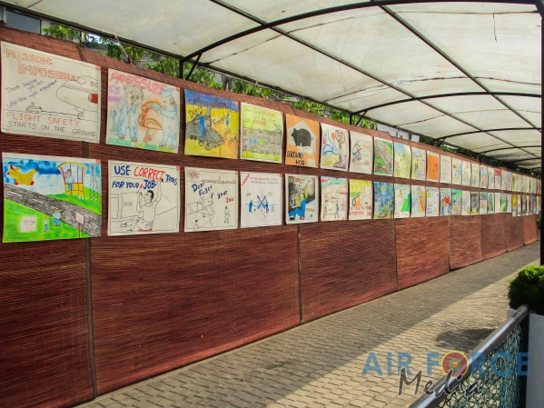 FLIGHT SAFETY POSTER COMPETITION WINNERS RECEIVE AWARDS FROM THE COMMANDER