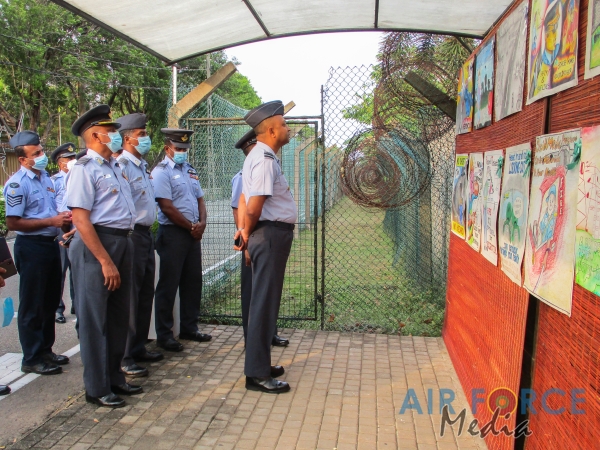 FLIGHT SAFETY POSTER COMPETITION WINNERS RECEIVE AWARDS FROM THE COMMANDER