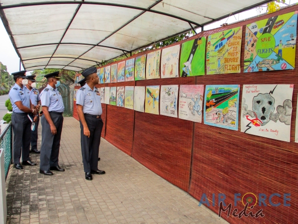 FLIGHT SAFETY POSTER COMPETITION WINNERS RECEIVE AWARDS FROM THE COMMANDER