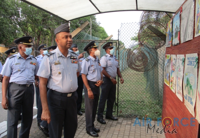 FLIGHT SAFETY POSTER COMPETITION WINNERS RECEIVE AWARDS FROM THE COMMANDER