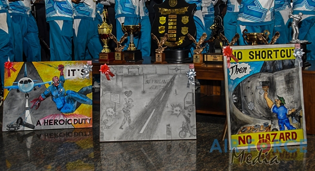 FLIGHT SAFETY POSTER COMPETITION WINNERS RECEIVE AWARDS FROM THE COMMANDER