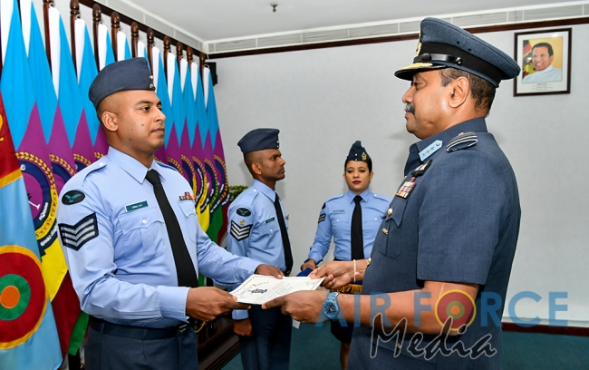 Awarding of a Flight Engineer Brevet, a Fighter Controller Badge and Certificates of Commendation
