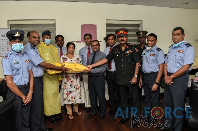 SLAF Hands over Locally Manufactured Personal Protective Equipment Kits to Health Ministry