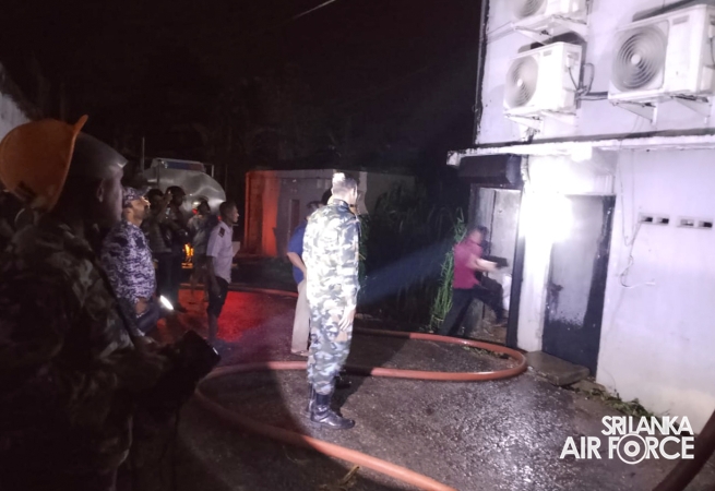 SLAF ASSISTS IN EXTINGUISHING FIRE AT SINGER SHOWROOM IN MIRIGAMA