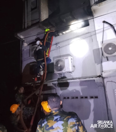 SLAF ASSISTS IN EXTINGUISHING FIRE AT SINGER SHOWROOM IN MIRIGAMA