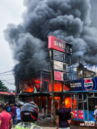 SLAF
ASSISTS IN EXTINGUISHING FIRE AT SINGER SHOWROOM IN VAVUNIYA