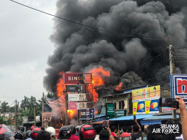 SLAF
ASSISTS IN EXTINGUISHING FIRE AT SINGER SHOWROOM IN VAVUNIYA