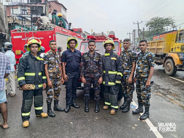 SLAF
ASSISTS IN EXTINGUISHING FIRE AT SINGER SHOWROOM IN VAVUNIYA