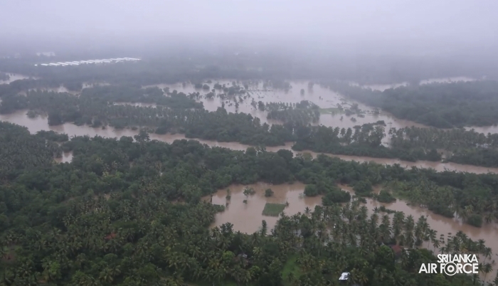 SLAF BELL
212 RESCUES THREE PERSONS STRANDED BY FLOODS IN MAHAWA (ELLA)