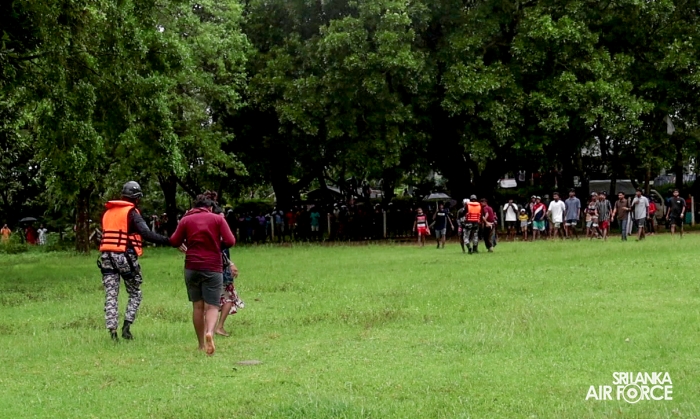 SLAF BELL
212 RESCUES THREE PERSONS STRANDED BY FLOODS IN MAHAWA (ELLA)