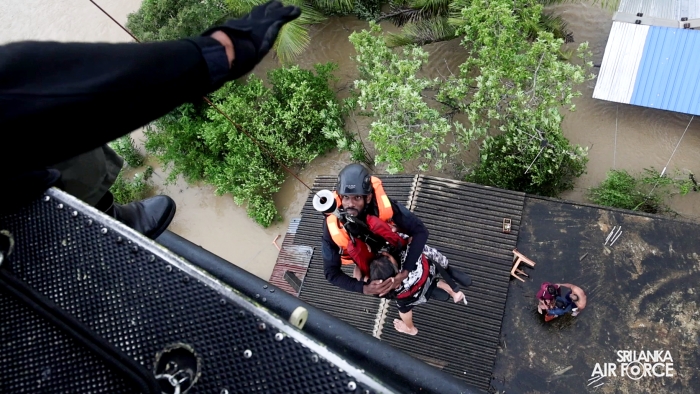SLAF BELL
212 RESCUES THREE PERSONS STRANDED BY FLOODS IN MAHAWA (ELLA)