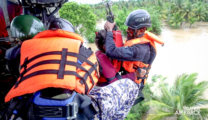 SLAF BELL
212 RESCUES THREE PERSONS STRANDED BY FLOODS IN MAHAWA (ELLA)